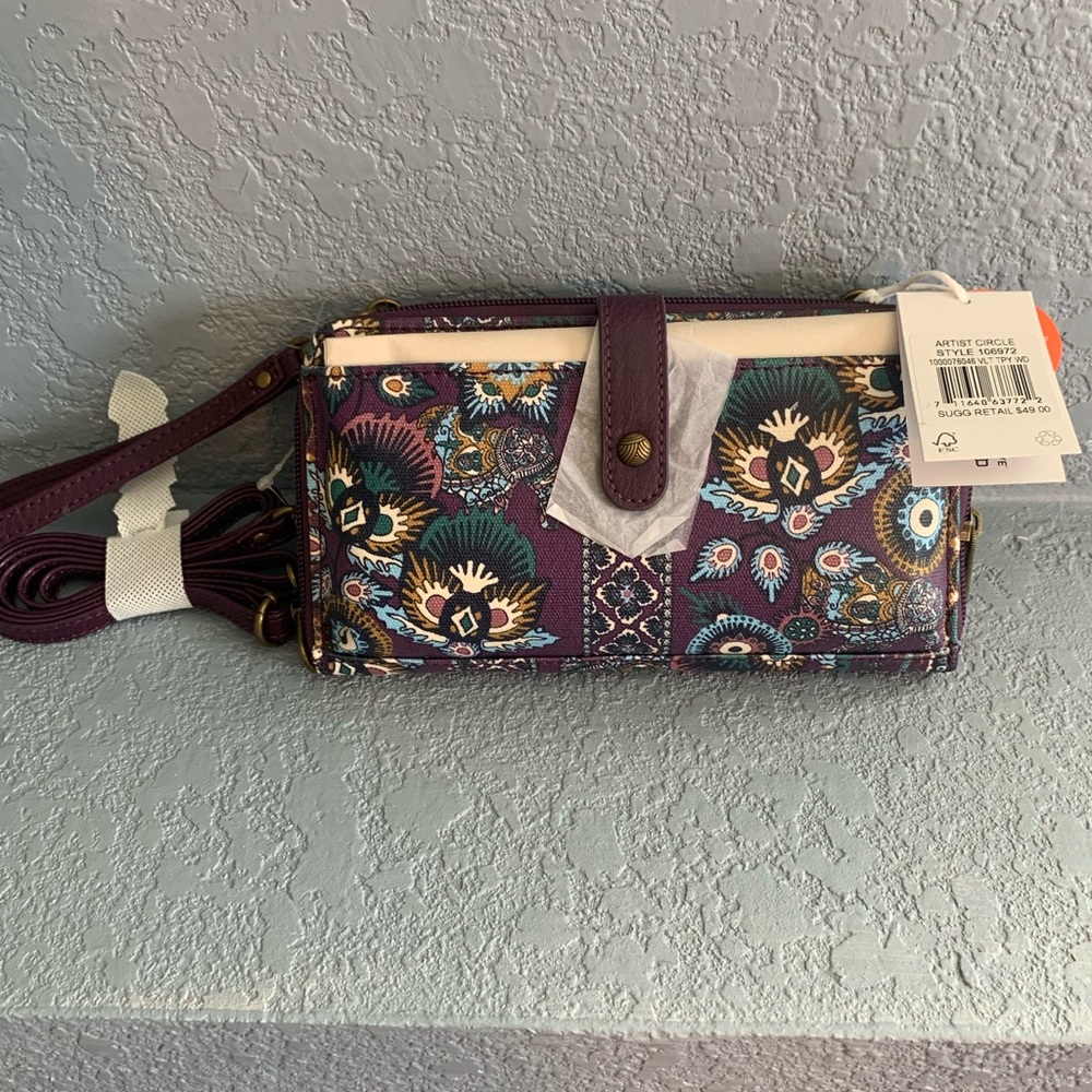 NWT Sakroots wallet/phone carrier. Maroon with decorations.